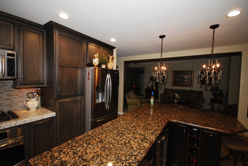 Baltic Brown L shape Island Top with Cambria New Quay Countertop, Slate Stain Ebony Glazed Maple Cabinets and New Laguna Typhoon Matchstick Backsplash, Stainless Steel Appliance and Kitchen Crystal Chandeliers